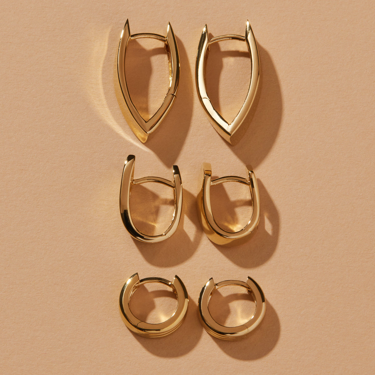 Sterling Silver & Yellow Gold Plated 6x11mm Flared Huggie Earrings